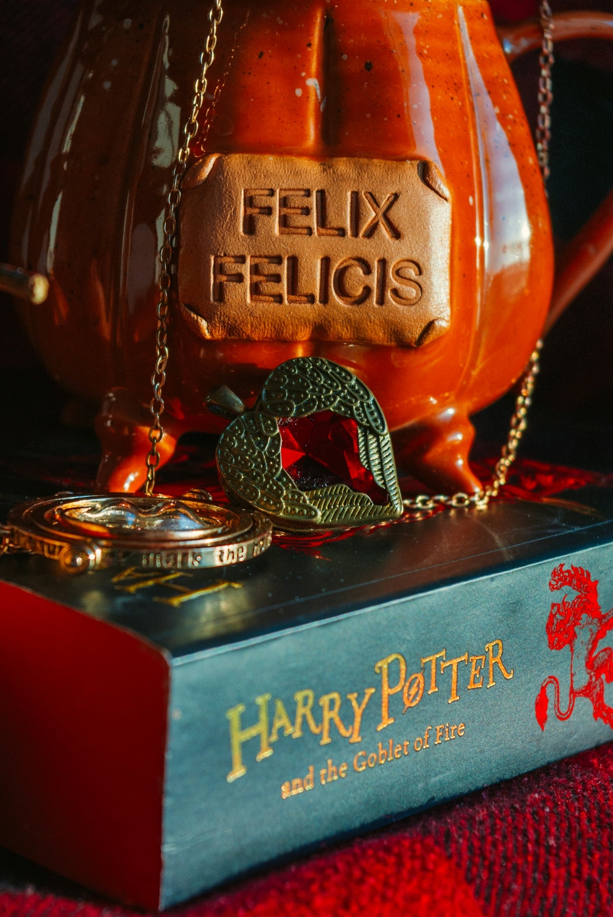 a harry potter book with a teapot on top of it