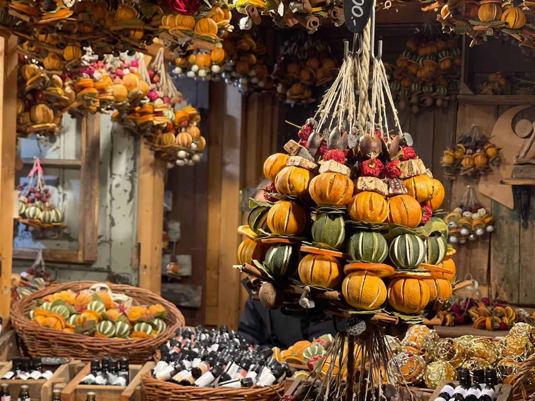 A display of pumpkins and gourds in a store